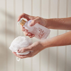 Thymes close-up of pour and creamy lather demonstrating gentle hydration