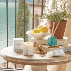 Thymes hand cream in use applied to hands demonstrating quick hydration and non-greasy feel