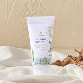 Thymes hand cream texture close-up showing creamy finish and fast absorption benefit
