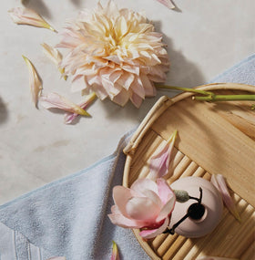 Thymes Kimono Rose packaged as a gift displaying artisan-designed label