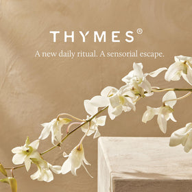 Thymes bottle with lavender sprigs evoking calming scent benefit