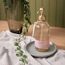 Thymes bottle styled on bathroom counter creating inviting sink ambiance benefit