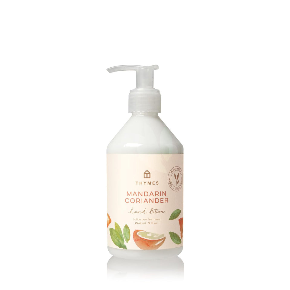 Thymes front bottle showing branding and Mandarin Coriander scent benefits