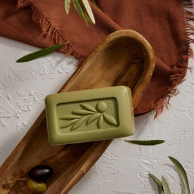Thymes olive leaf styled in bathroom setting, suggests everyday luxury and decor