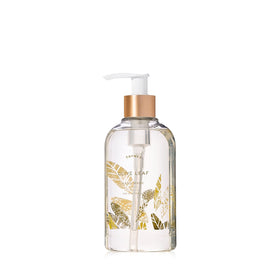 Thymes bottle front pump showing olive leaf scent and elegant design benefits hand care