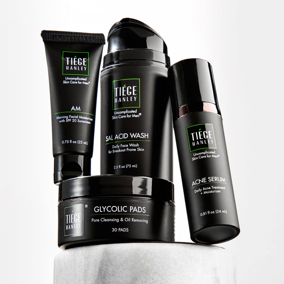 Tiege Hanley front packaging showing the complete four-piece acne kit for easy routine