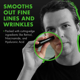 Tiege Hanley retinol stick held in hand to show size and portability for on-the-go grooming