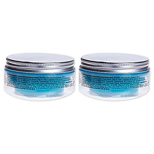 TIGI Bed Head jar held in hand to show 2 oz size and travel-friendly convenience