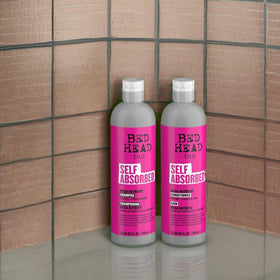 TIGI Bed Head in-shower use with hands applying product for manageability
