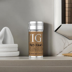TIGI Bed Head warmed by a hair dryer to increase glide and high-definition shine