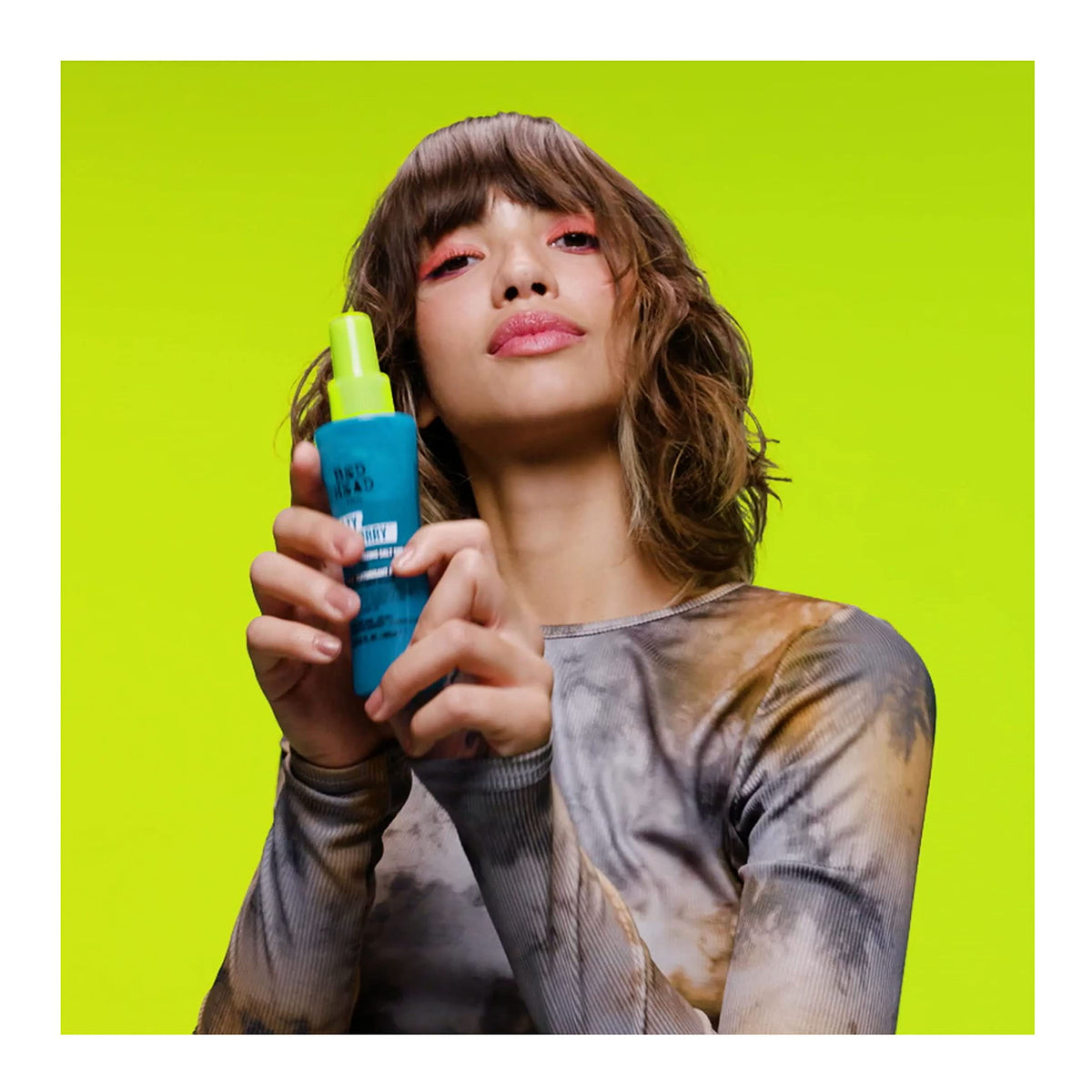 TIGI product label highlighting Dead Sea Salt ingredient benefits