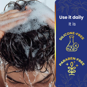 Tio Nacho being applied in shower to wet hair for fuller-looking results