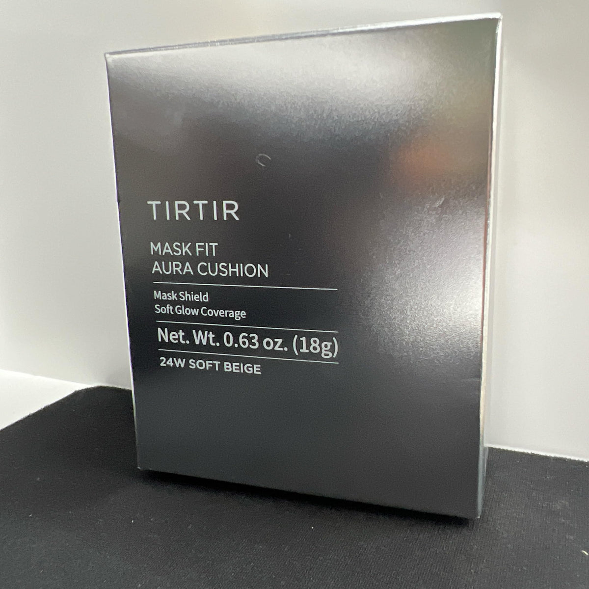 TIRTIR compact in a purse showing portable size and touch-up convenience