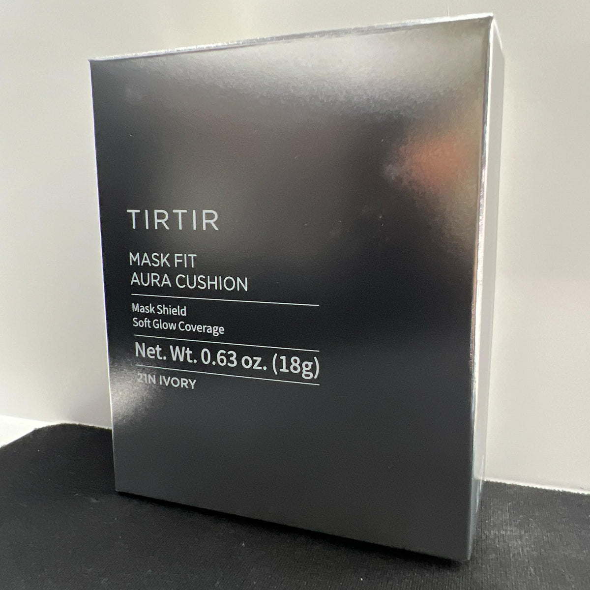 TIRTIR compact in hand showing true scale and travel-friendly size