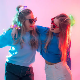 TIZAPIB scrunchies at a party scene showing visibility and fun