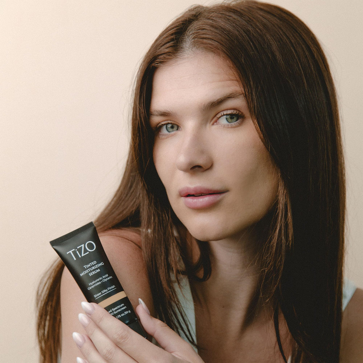 TIZO application on hand blended finish demonstrating sheer coverage benefit