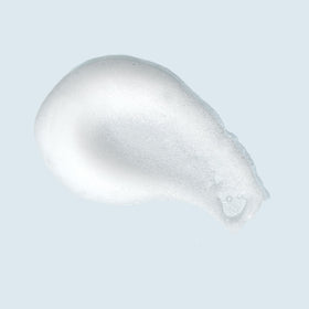 TIZO close-up of cleanser texture and pump dispensing foam, highlights gentle lather benefit