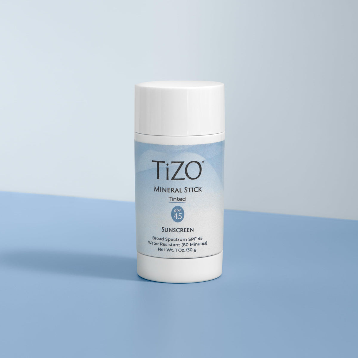 TIZO mineral stick twist-up mechanism visible for easy mess-free application