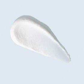 TIZO creamy-sheer texture close-up illustrating lightweight matte finish