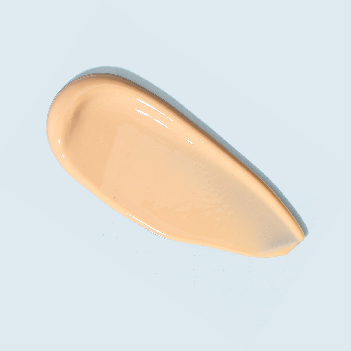 TIZO close-up texture swatch highlighting smooth moisturizing finish