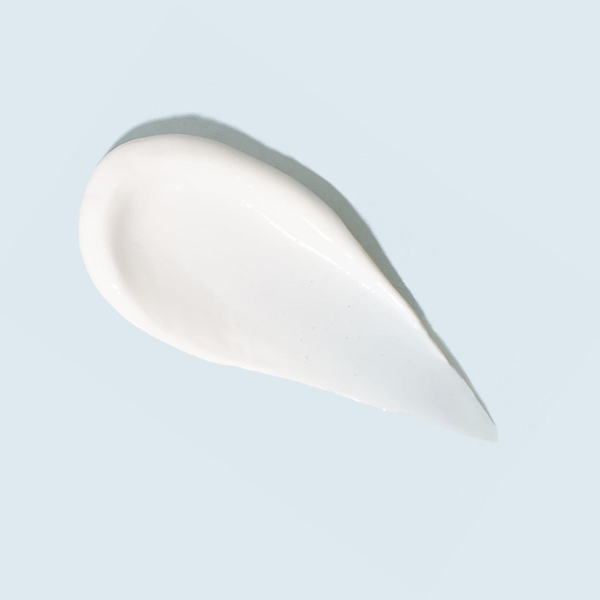 TIZO cream texture close-up highlighting sheer moisturizing finish