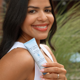 TIZO lifestyle outdoor shot illustrating daily sun protection for face while active
