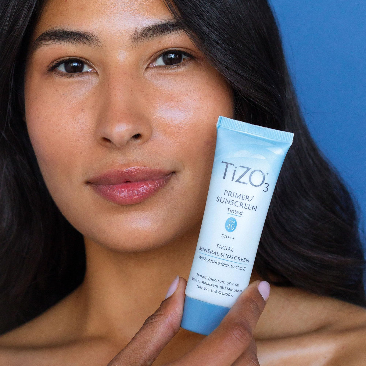 TIZO packaging label close-up highlighting mineral ingredients and fragrance-free benefit