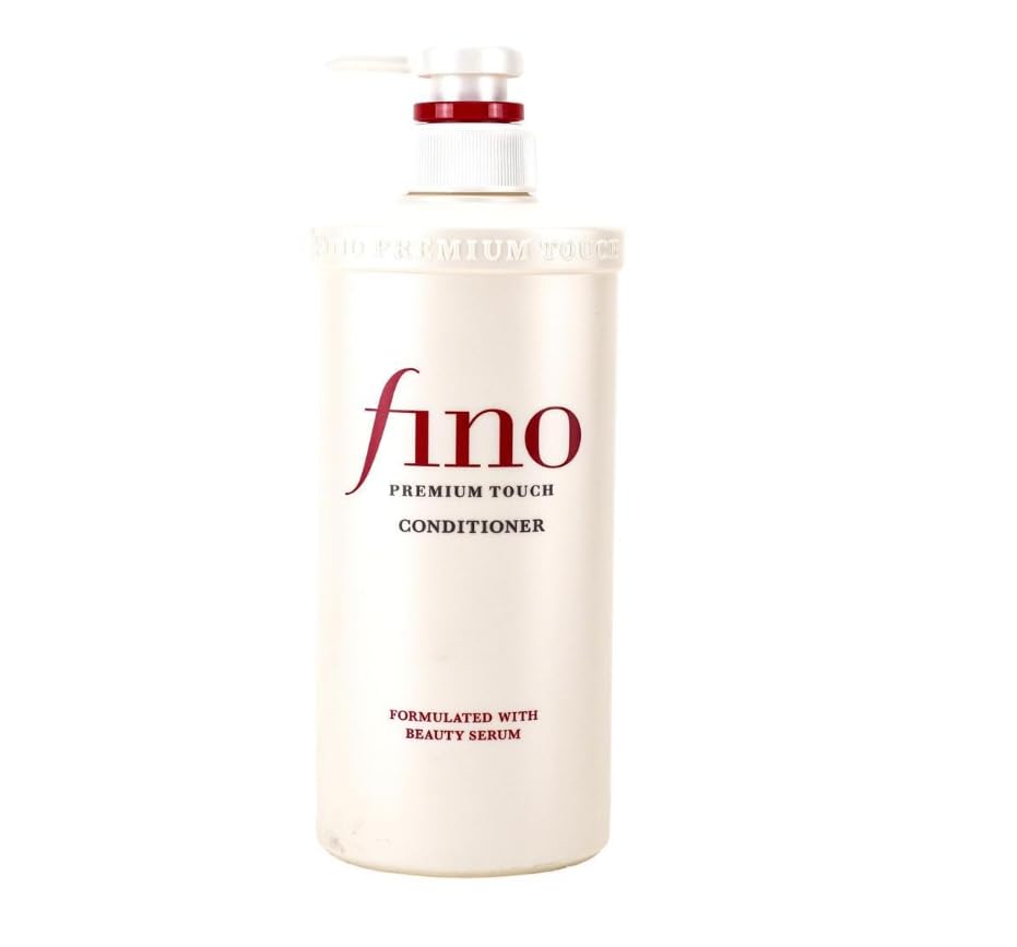 TJ SIGNATURE bottle on bathroom shelf conveying everyday luxury routine