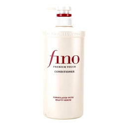 TJ SIGNATURE bottle on bathroom shelf conveying everyday luxury routine