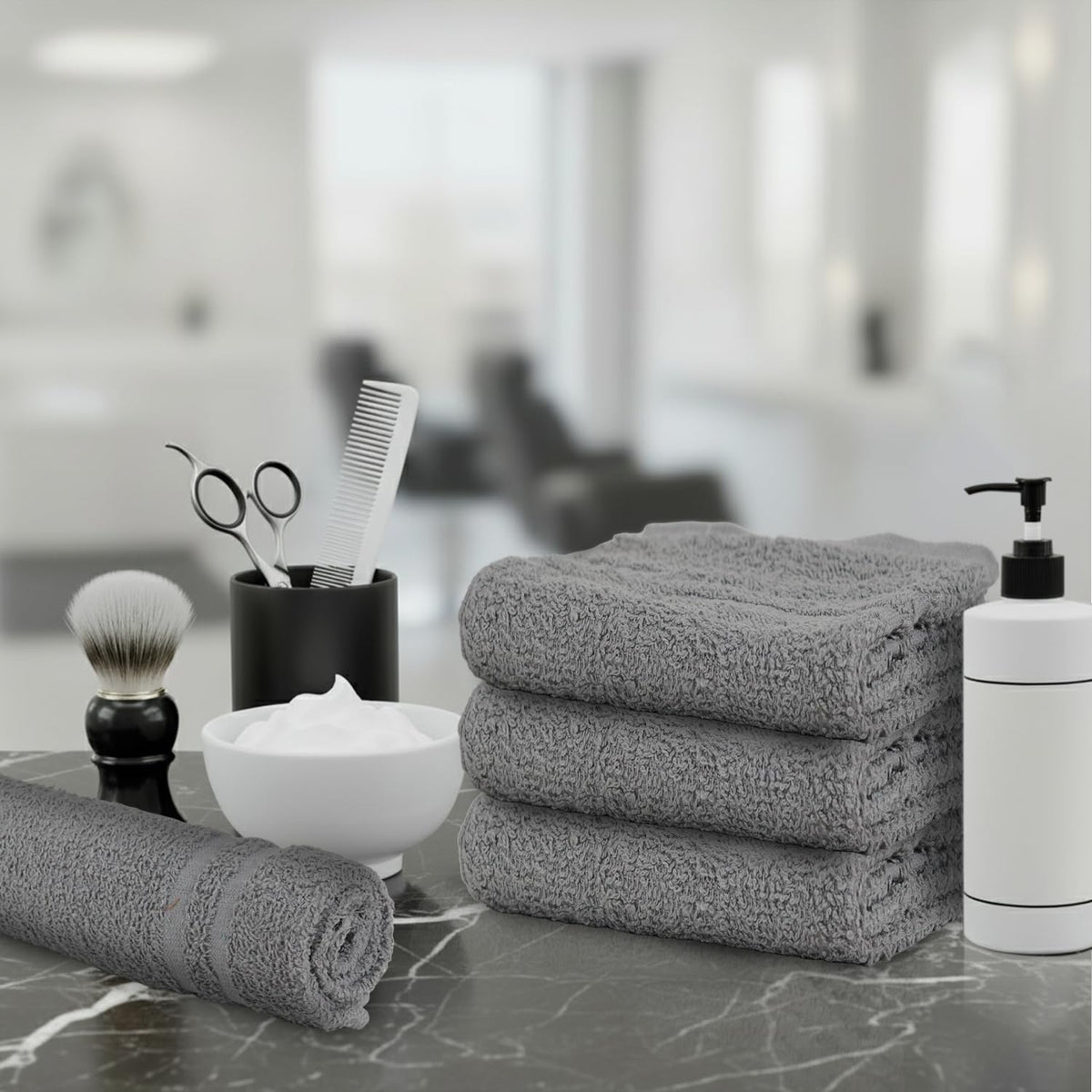 TOALLA towel held in hand demonstrating compact size and easy grip