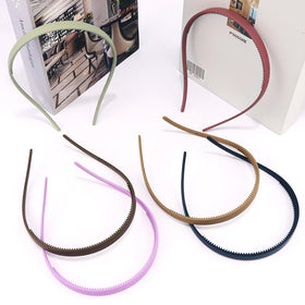 TOBATOBA headbands inside a travel bag portraying portable style and everyday convenience