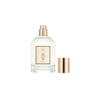 Tocca Florence size comparison 3.4 fl oz illustrating handbag-friendly portability