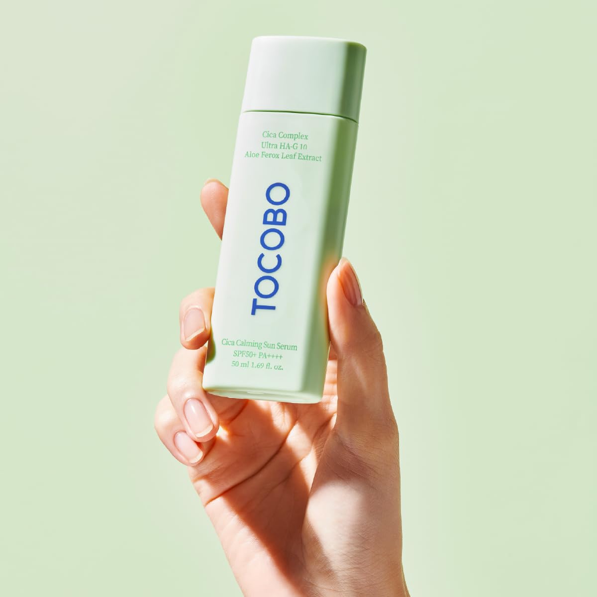 TOCOBO serum on hand showing lightweight spread and coverage