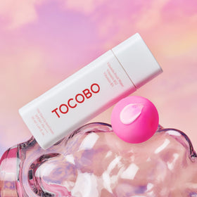 TOCOBO pink tint swatch on skin demonstrating brightening effect
