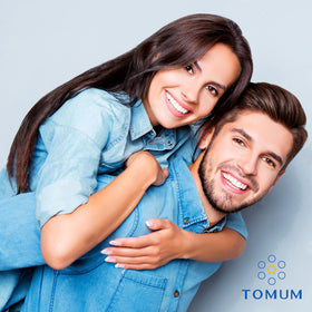 TOMUM bottle on bathroom shelf lifestyle shot showing daily-routine compatibility