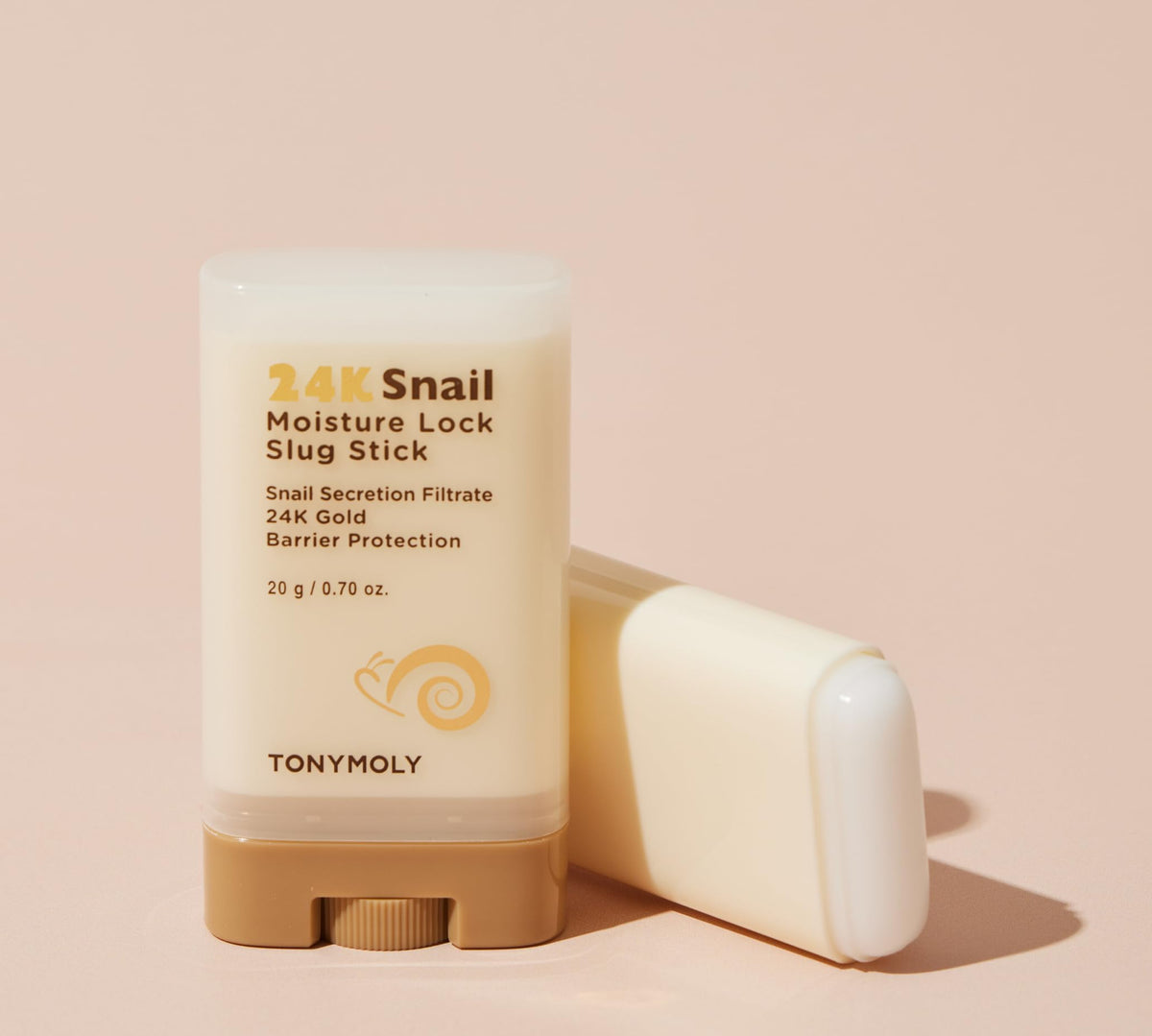 TONYMOLY 24K Snail stick texture close-up showing smooth balm for seamless sealing benefit