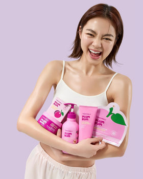 TONYMOLY bottle staged on bath shelf conveying spa-like routine benefit