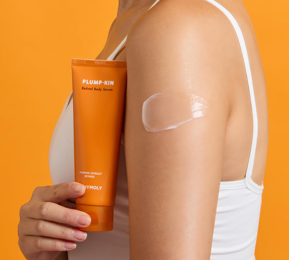 TONYMOLY serum being applied to arm demonstrating smoothing effect