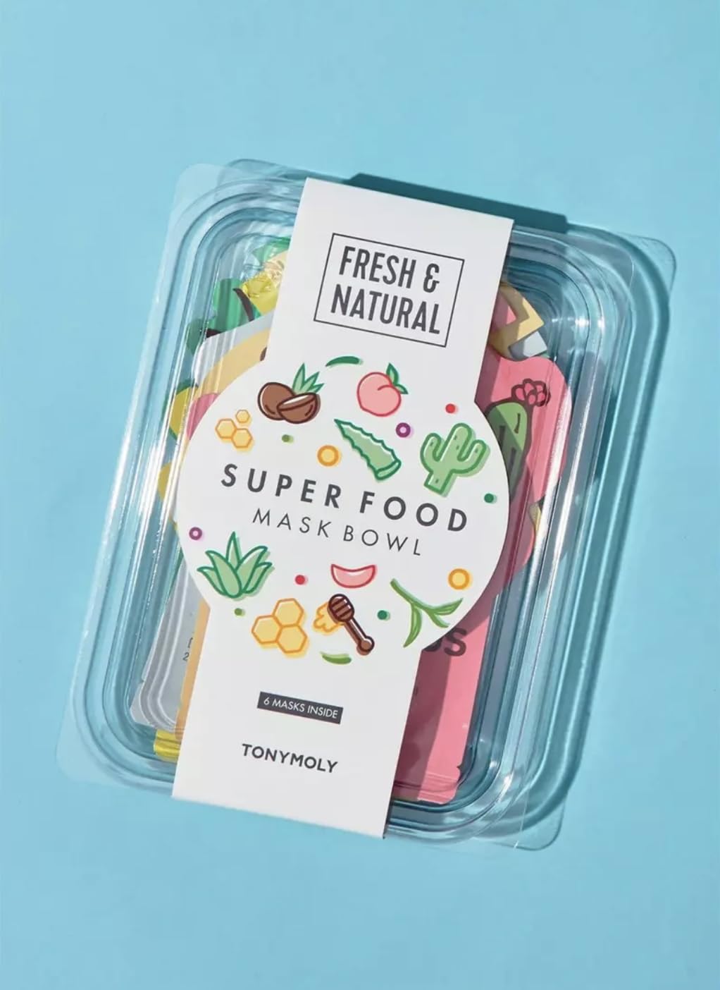 TONYMOLY close-up of sheet mask texture soaked in serum, revealing nourishing ingredients and hydrating benefit