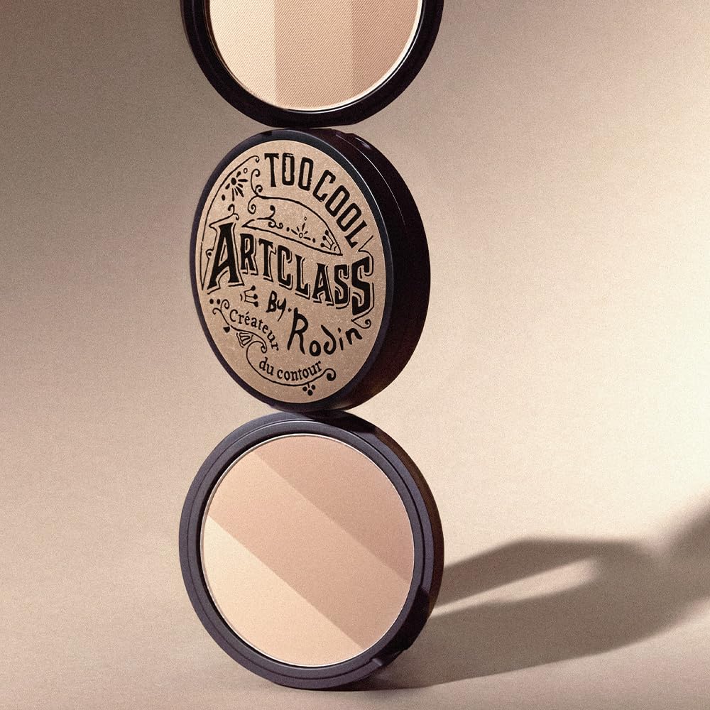 Too Cool For School compact next to coin showing compact size for travel