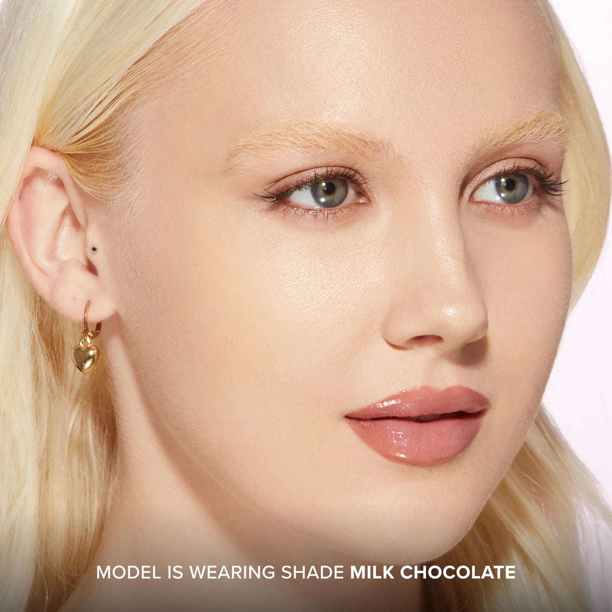 Too Faced product applied to cheek illustrating sculpting and natural warmth