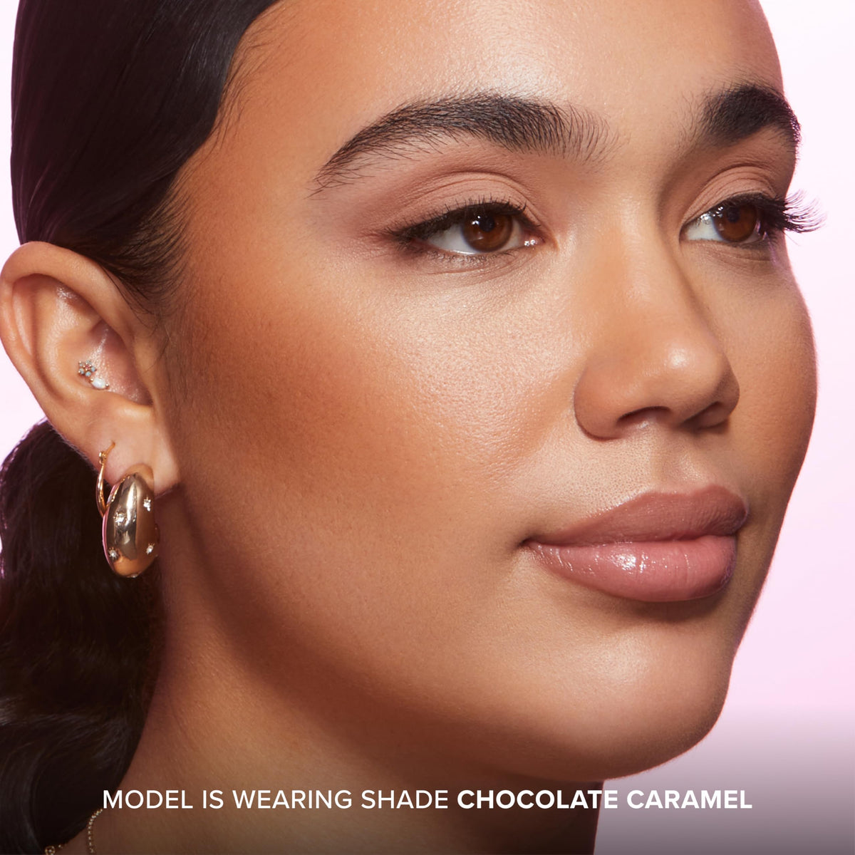 Too Faced Chocolate Soleil being buffed with a dense brush for seamless sculpting benefit