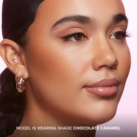 Too Faced Chocolate Soleil being buffed with a dense brush for seamless sculpting benefit