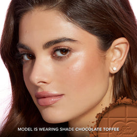 Too Faced bronzer brush application demonstrating easy, buildable coverage