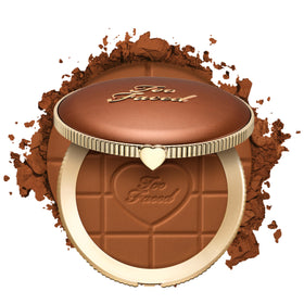 Too Faced bronzer front packaging showing compact and label benefits