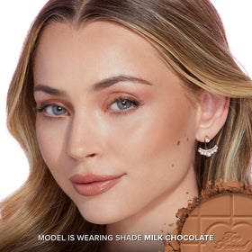 Too Faced arm swatches showing Milk Chocolate shade versatility