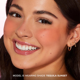 Too Faced packaging side label showing ingredient claims and travel-friendly dimensions