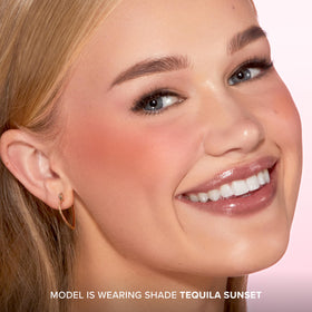 Too Faced three swatches on skin showing buildable shades and customizable intensity