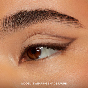 Too Faced eyeliner applied along lash line demonstrating long-wear benefit