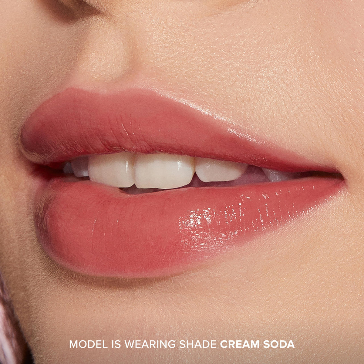 Too Faced texture swatches of Cream Soda tint demonstrating buildable color and glossy finish